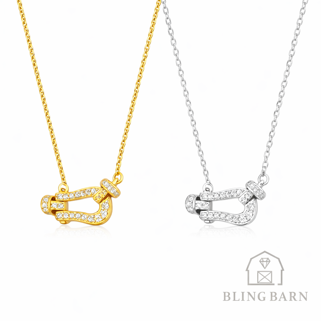 Two necklaces, one gold and one silver, with a 'Bling Barn' logo.