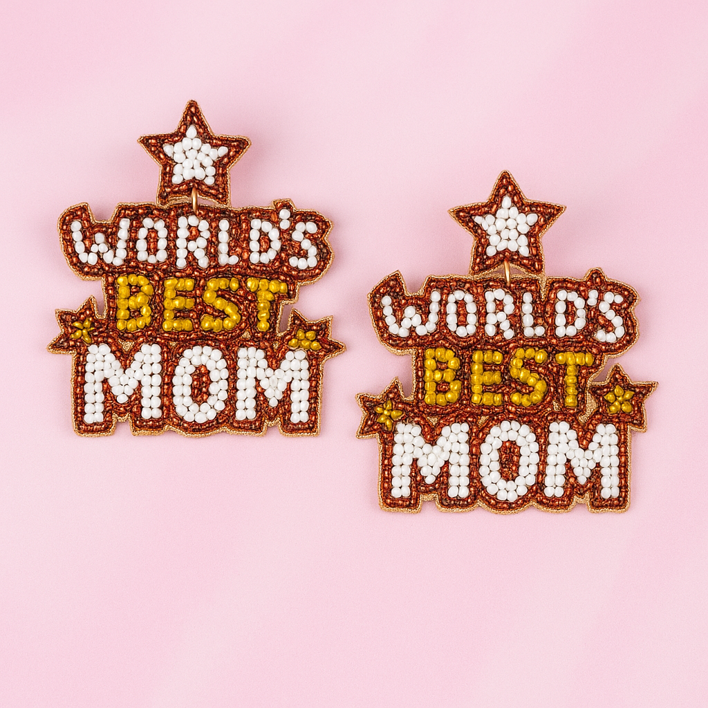 Two 'World's Best Mom' earrings with stars on a pink background