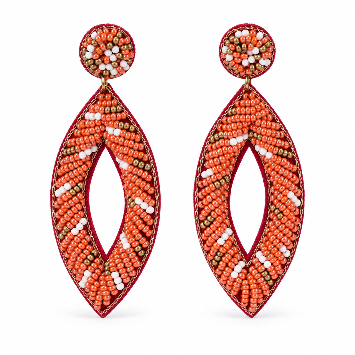 A pair of large beaded dangle earrings with a red embroidered frame, filled with orange, white, and brown seed beads, shown on a plain white background.