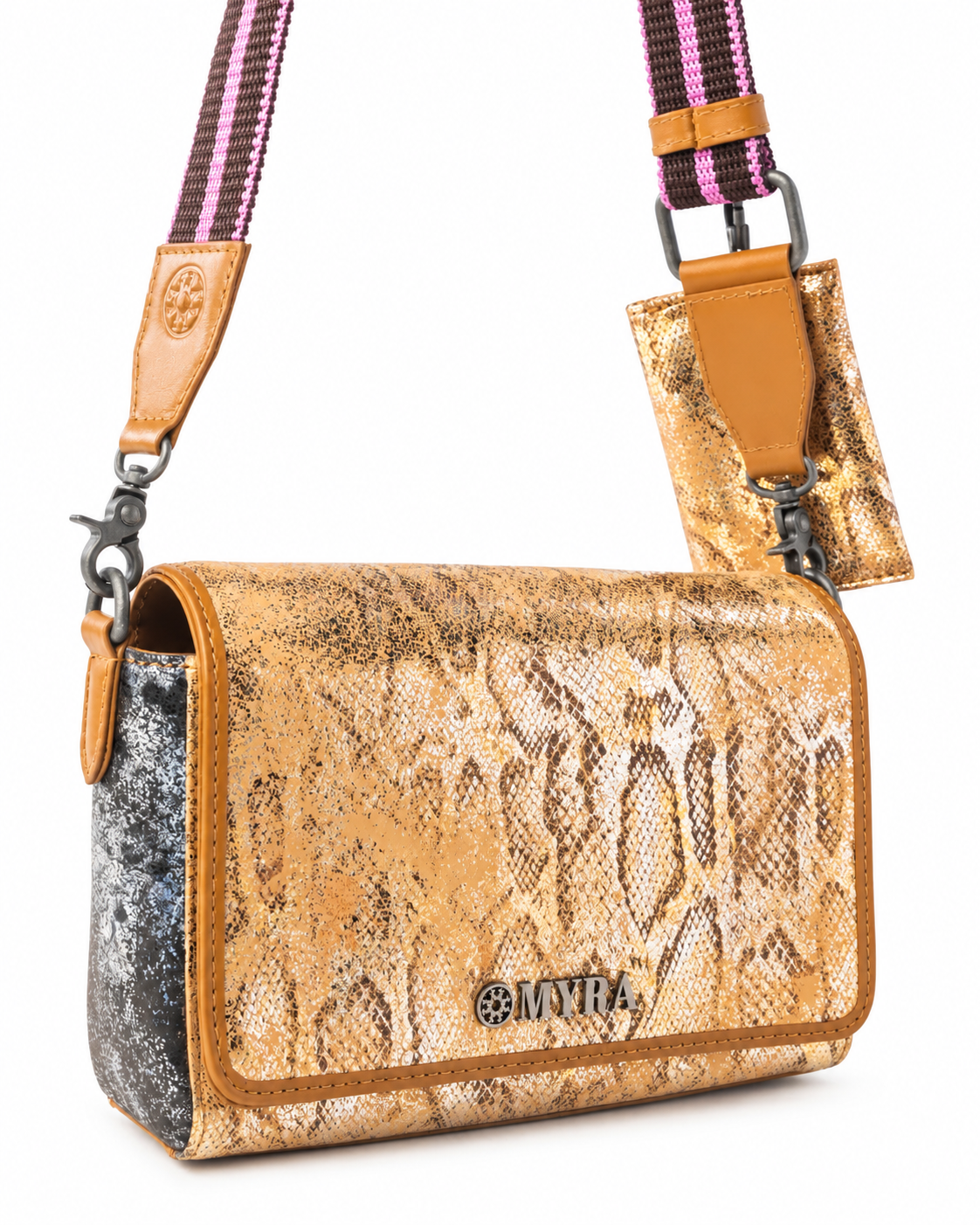A Myra brand shoulder bag featuring a metallic gold and brown snakeskin pattern on the main flap, a textured gray side panel, and a purple and pink striped fabric strap with tan leather accents.
