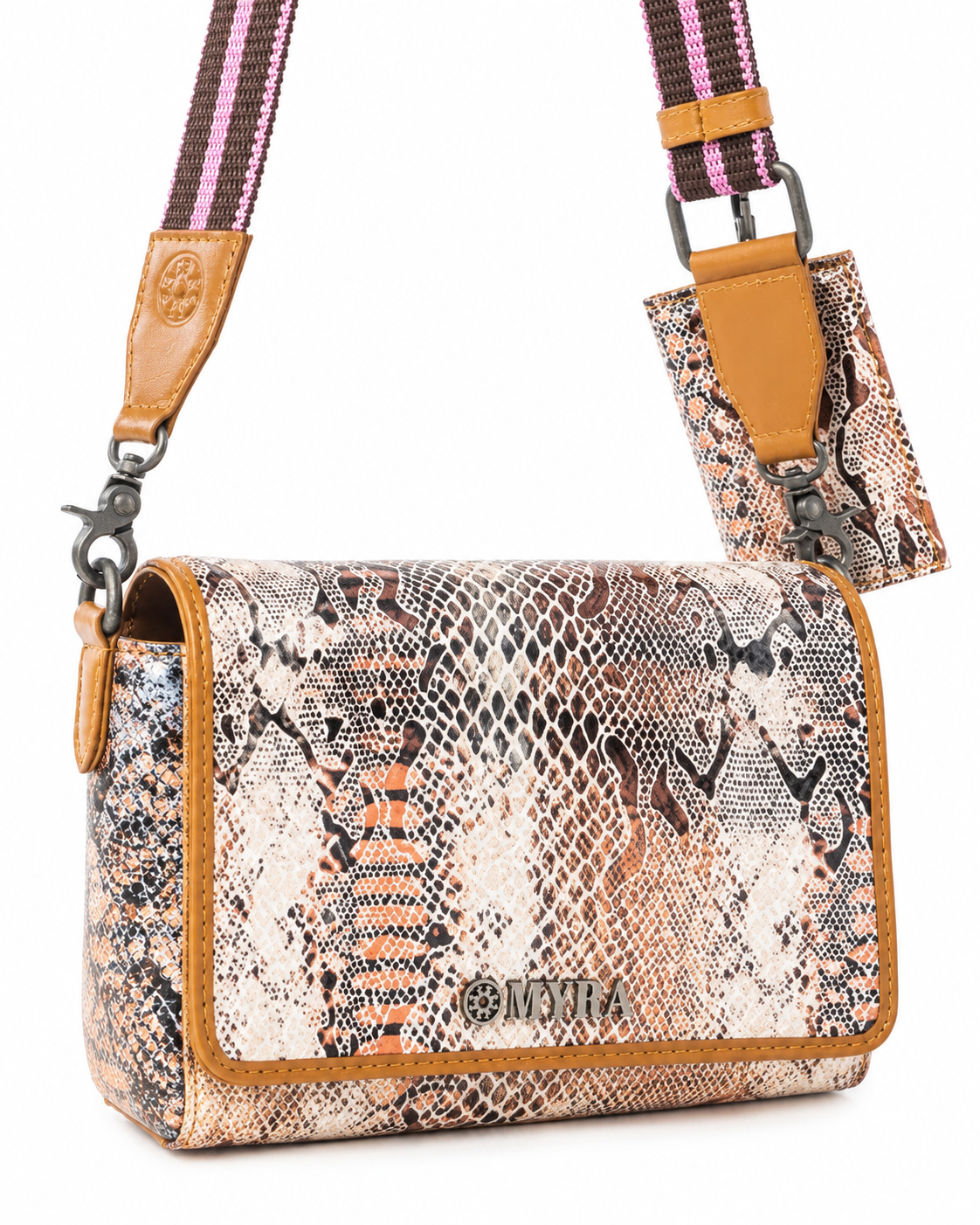 A rectangular shoulder bag with a snakeskin pattern in beige, brown, and black, featuring tan leather trim and a matching zippered pouch attached by a pink and brown patterned strap. The brand name 'MYRA' is embossed on the front and on the leather tab.