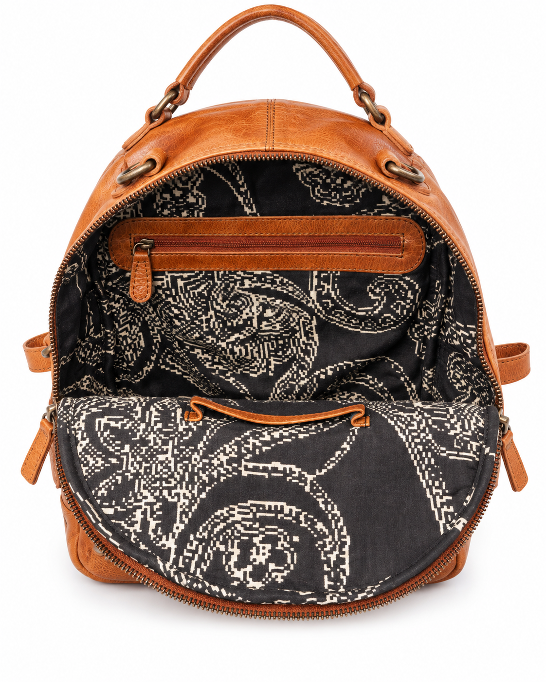 A brown leather backpack shown open against a white background, displaying a black and white paisley patterned interior lining with matching brown leather zippers and handles.