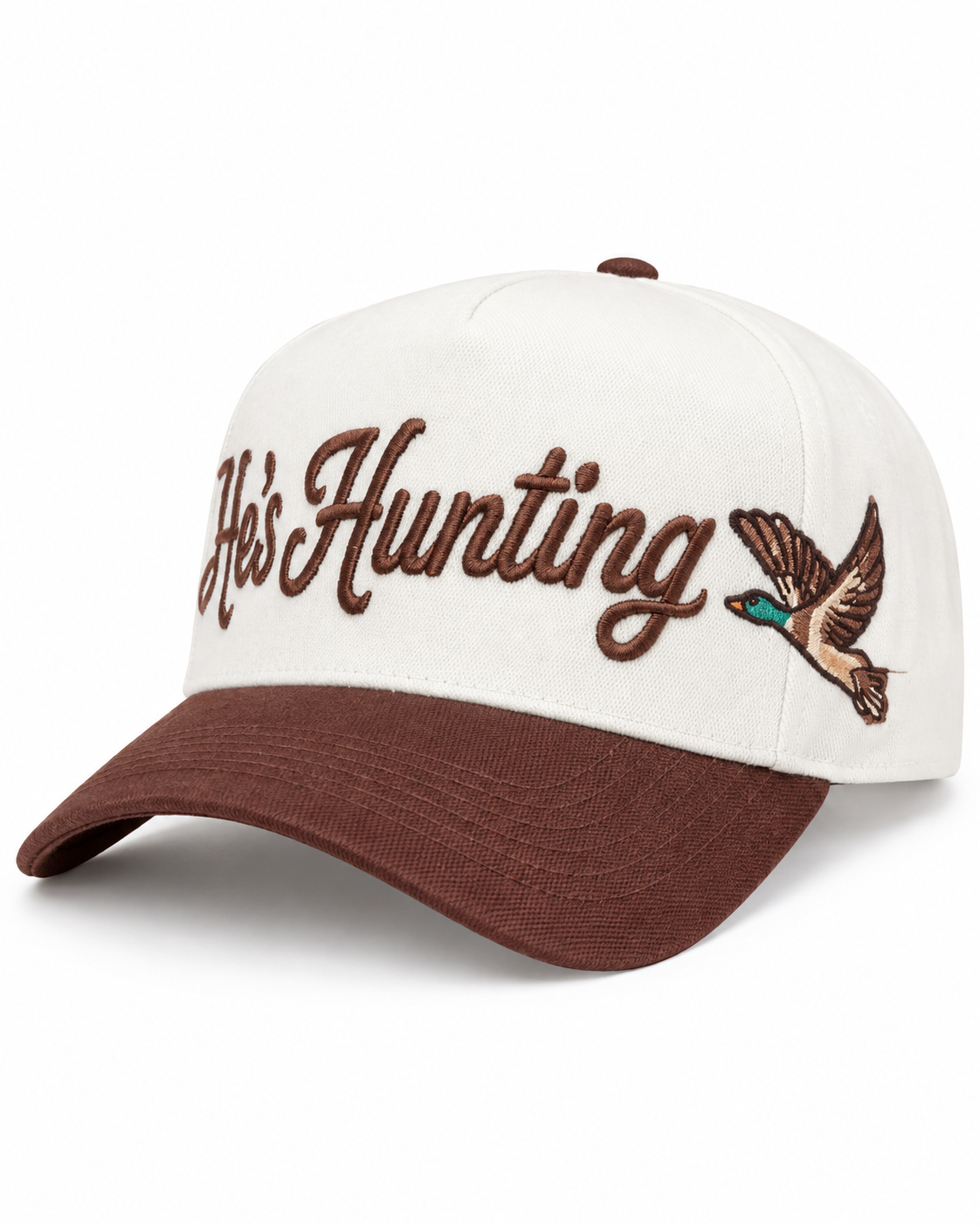 A white baseball cap with a brown visor, featuring 'He's Hunting' embroidered in brown script across the front alongside an embroidered brown bird.