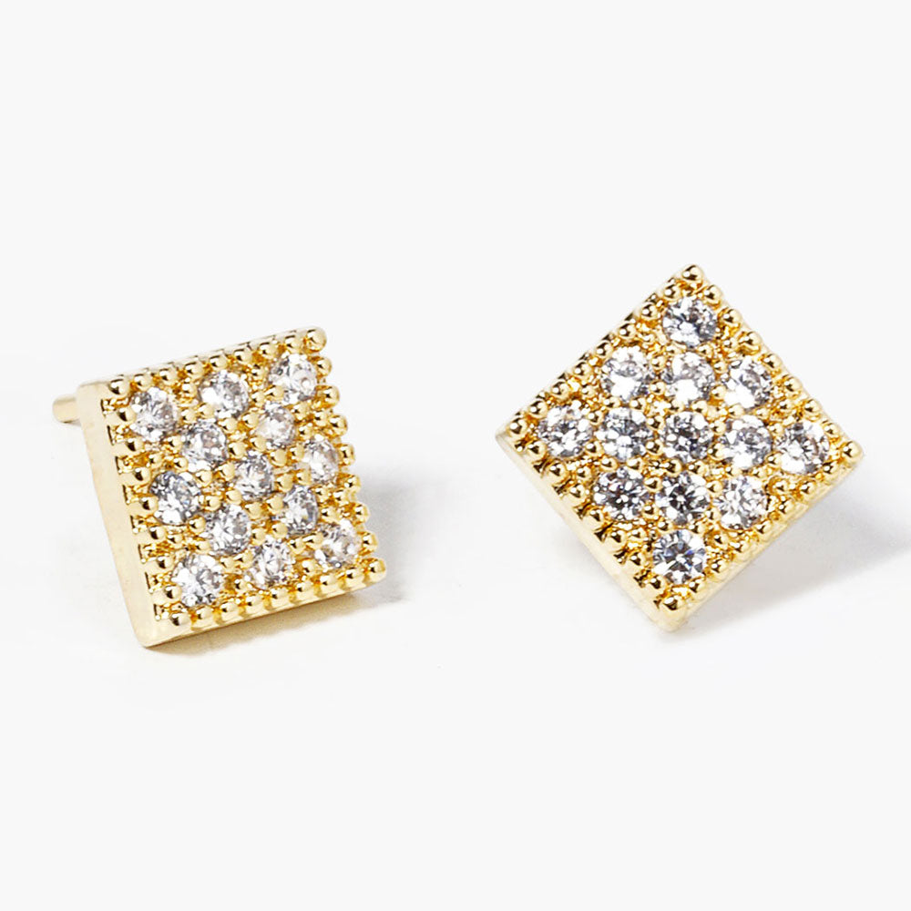A pair of square gold stud earrings set with clear pavé gemstones, photographed on a clean white background.