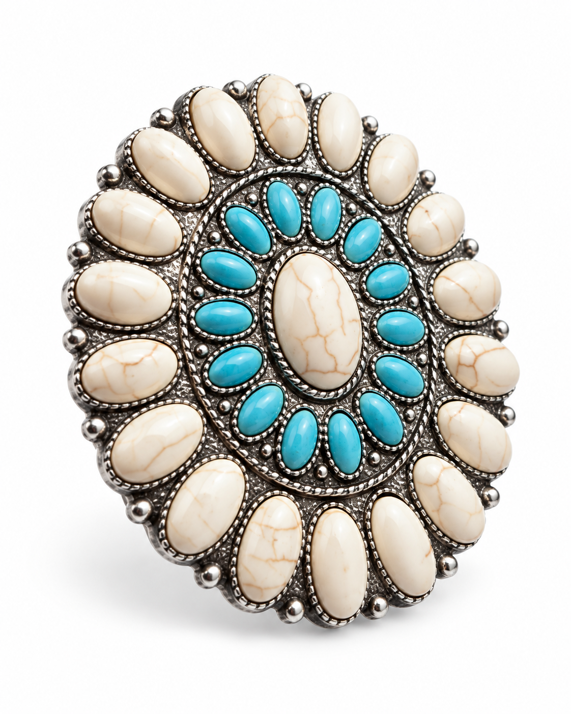 A large circular silver-toned statement ring featuring a central oval turquoise stone surrounded by a ring of smaller turquoise stones, with outer oval cream-colored stones set in silver bezel settings, shown on a white background.
