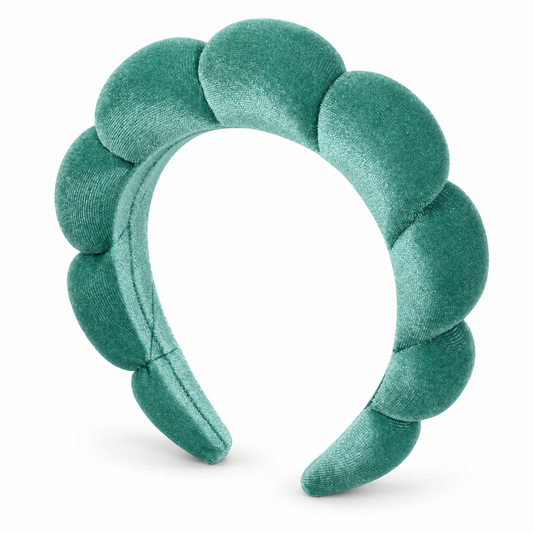 Green cloud foam headband with soft rounded lobes on a clean white background.