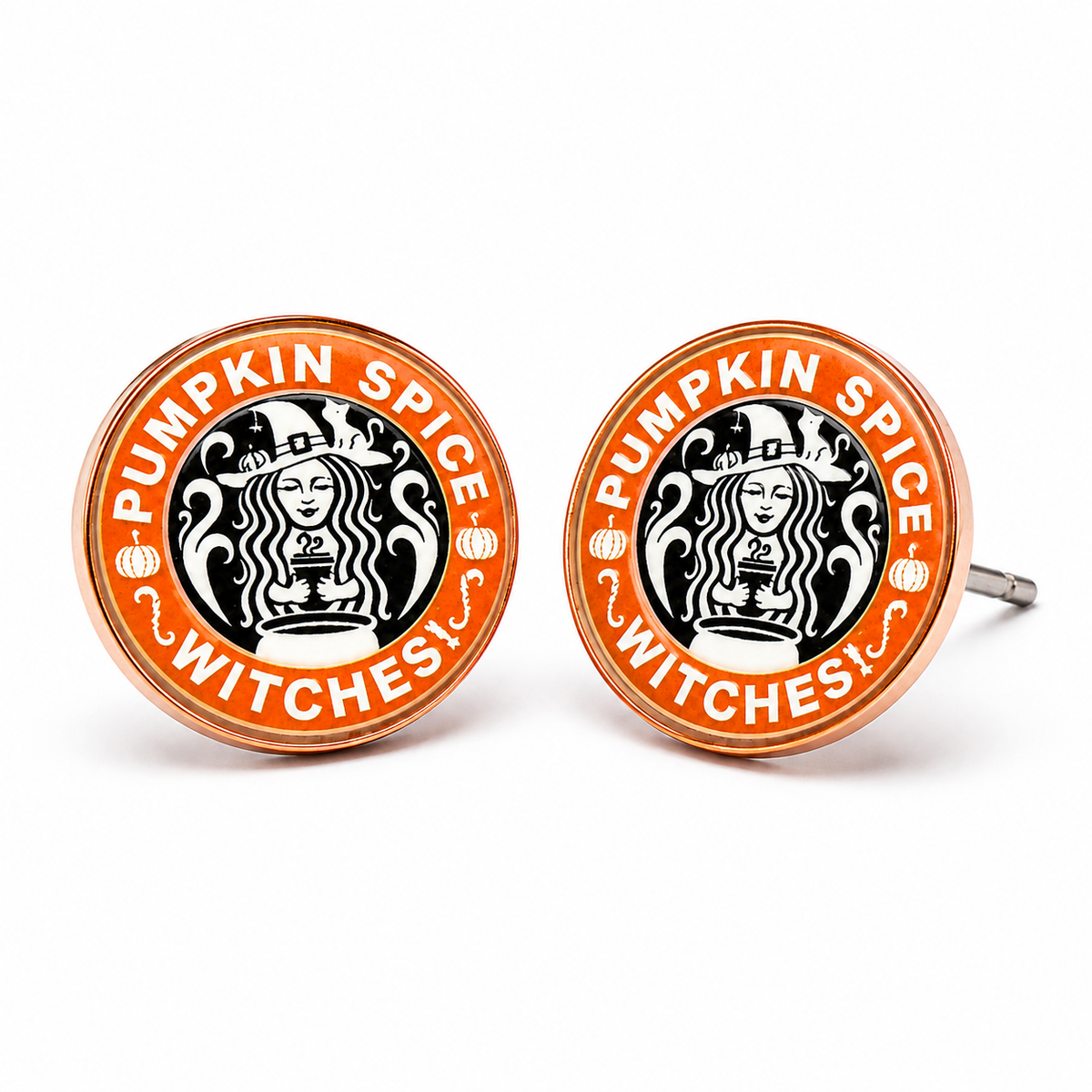 Close-up of Pumpkin Spice Witches stud earrings showing the round design, orange trim and earring posts.