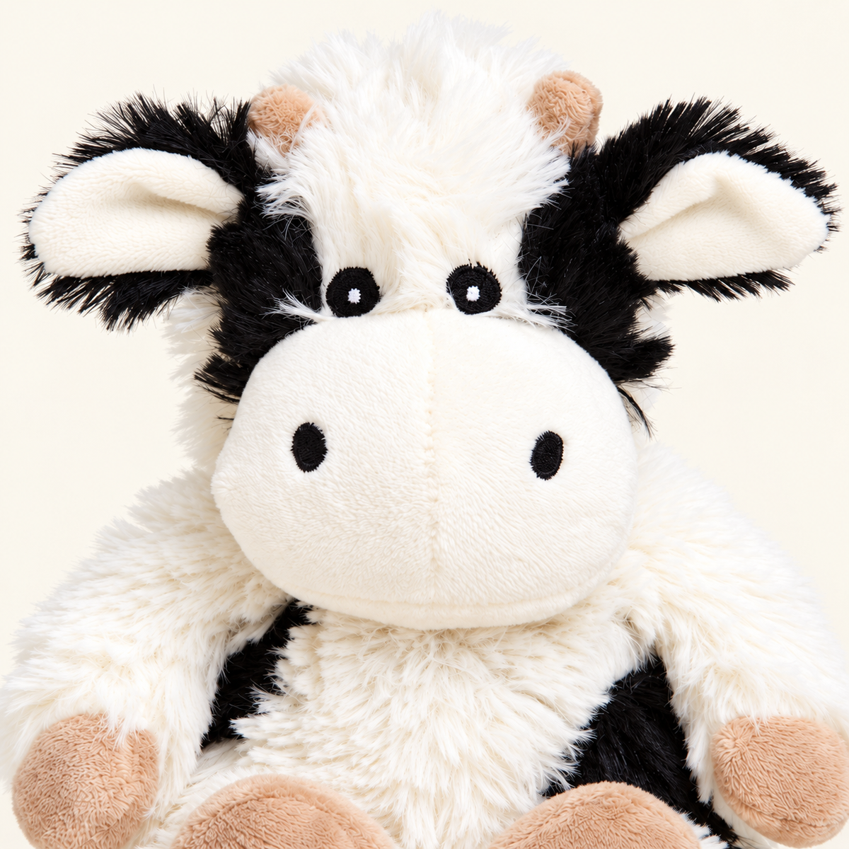 Warmies® Junior Black & White Cow | 9" Microwavable Lavender Plush