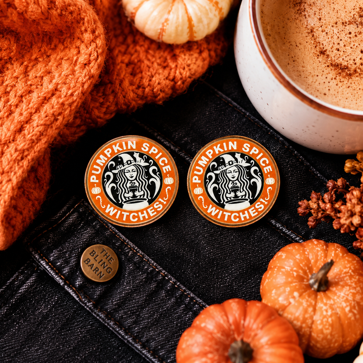 Pumpkin Spice Witches stud earrings styled with black denim, orange knit, pumpkins and a fall coffee.