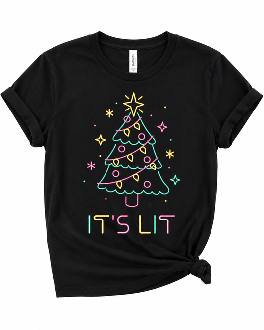 A black short-sleeve t-shirt with a colorful graphic of a Christmas tree and the text 'IT'S LIT' in neon-style colors, shown on a plain white background.