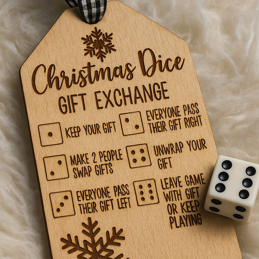 A wooden Christmas Dice Gift Exchange tag with engraved rules and snowflake designs, shown on a soft beige fabric background with a white die beside it.